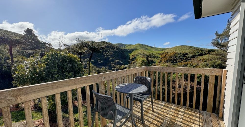 The view from the deck at Boulder Field House, out to the green hills of Belmont Regional Park