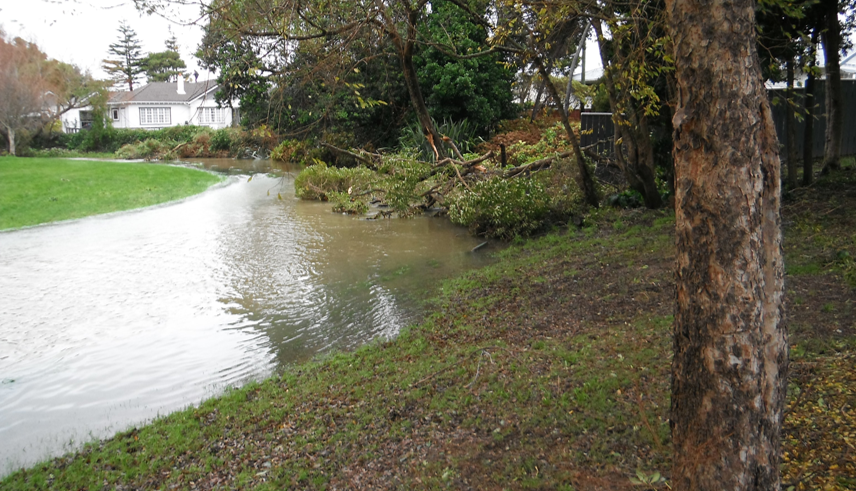 A flooded stream overflowing its banks
